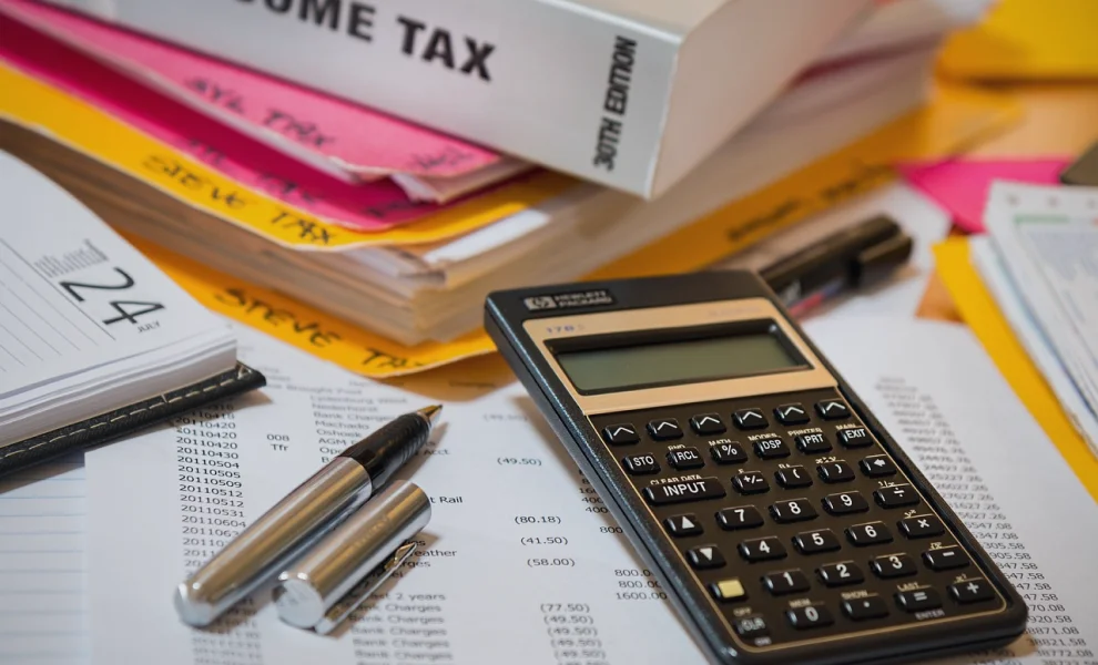 Illustration of tax forms and compliance documents for Tax Compliance Services
